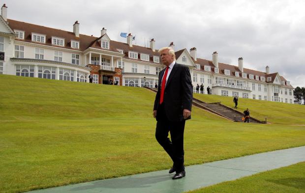 HeraldScotland: FILE PICTURE - Donald Trump at the Turnberry Golf Course in South Ayrshire.  See SWNS story SWTRUMP.  Irn-Bru has been banned from one of Donald Trump’s Scottish hotels.  Officials working for the US President fear it could stain the new carpets at Trum