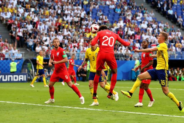 Dele Alli scores England's second goal during the World Cup quarter-final win over Sweden. Picture: Clive Rose/Getty Images