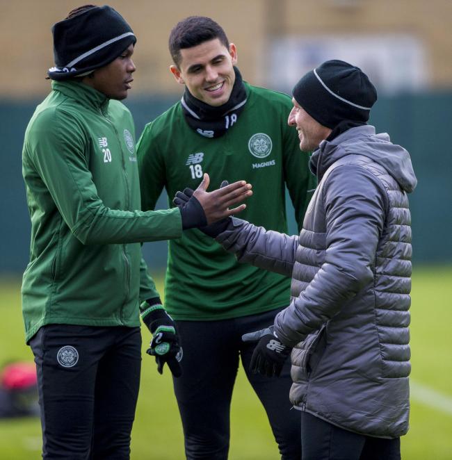 17/12/18.CELTIC TRAINING.LENNOXTOWN.Celtic manager Brendan Rodgers (right) speaks to Tom Rogic (centre) and Dedryck Boyata.