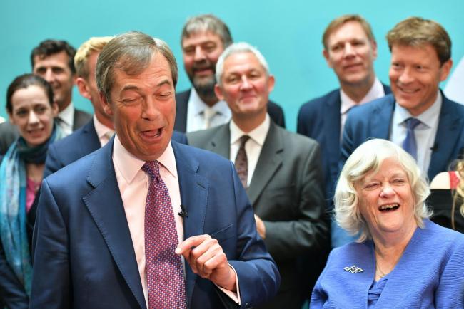 Brexit Party leader Nigel Farage with the Brexit party MEPs during a post election press conference for the Brexit Party at Carlton House Terrace in London. Picture: Dominic Lipinski/PA Wire.